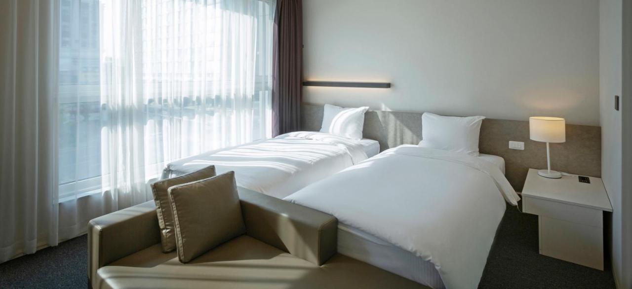 Grand City Hotel Чханвон Экстерьер фото