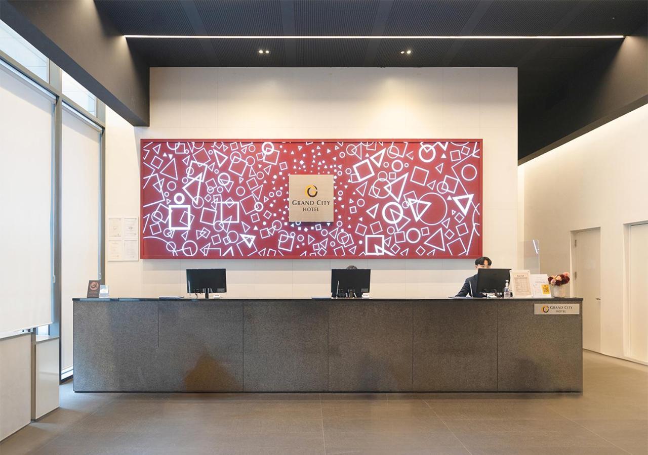 Grand City Hotel Чханвон Экстерьер фото